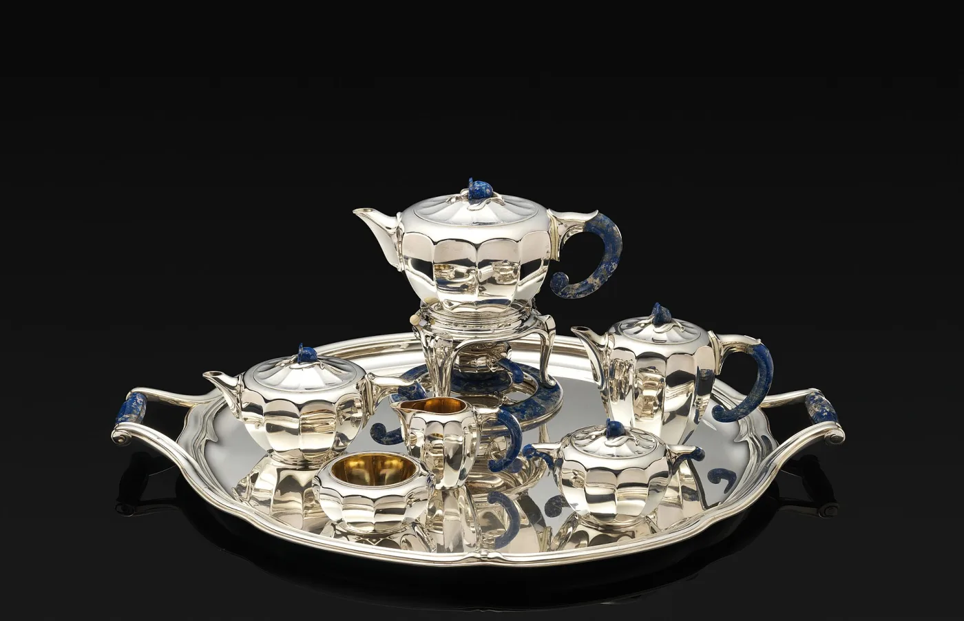Silver tea and coffee service with plain fluted bodies, lapis lazuli handles and finials, arranged on a matching two-handled tray
