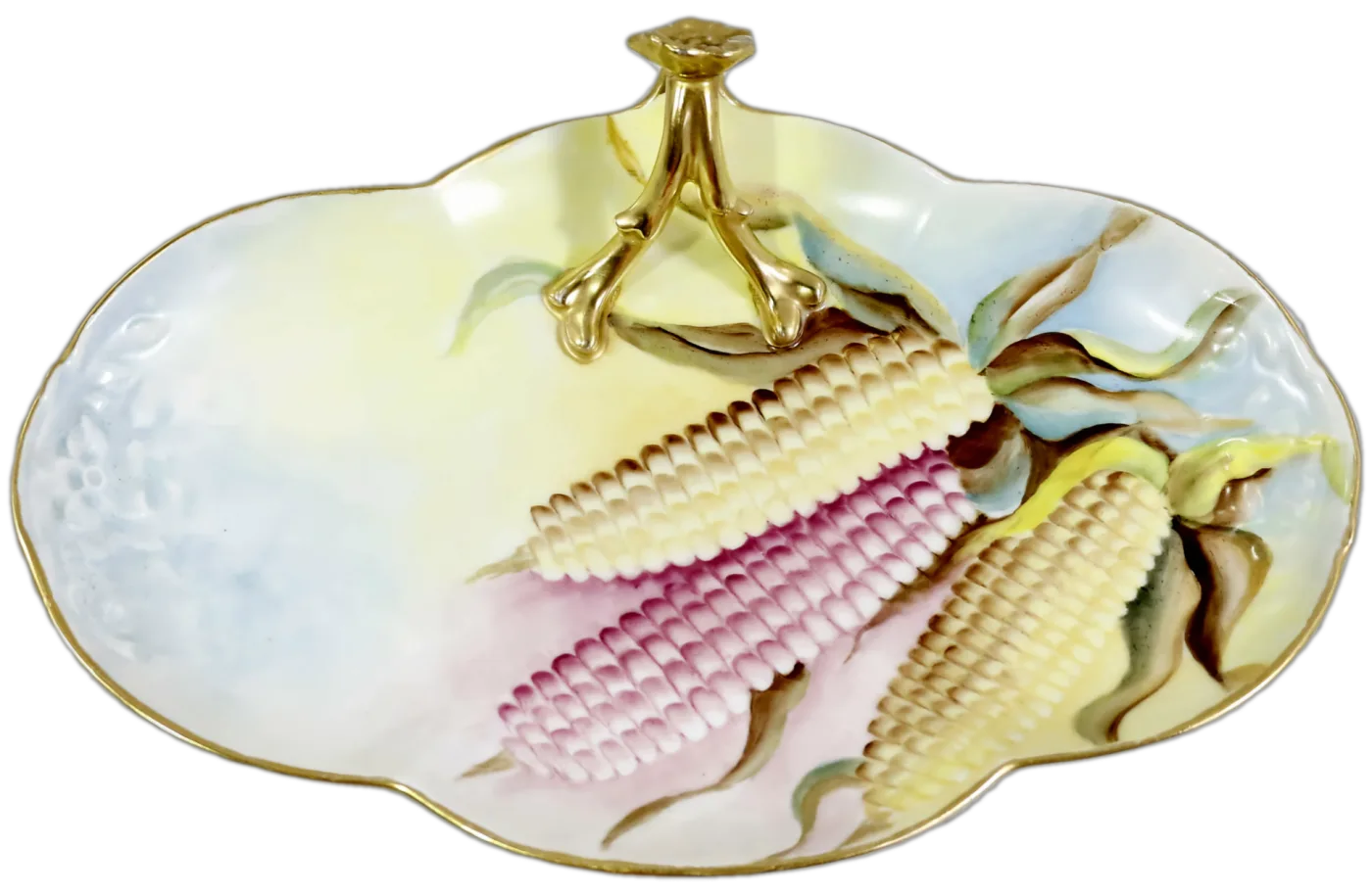 Oval porcelain dish with a gilt centre handle, hand-painted with three ears of corn in their husks against a shaded pale ground