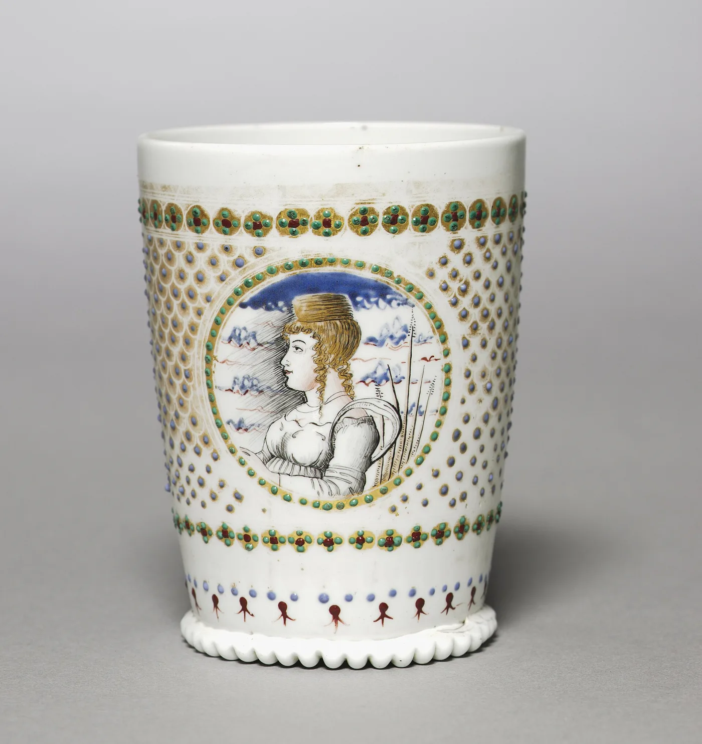 Milk-white Venetian beaker enamelled with the portrait of a young woman inside a gold roundel