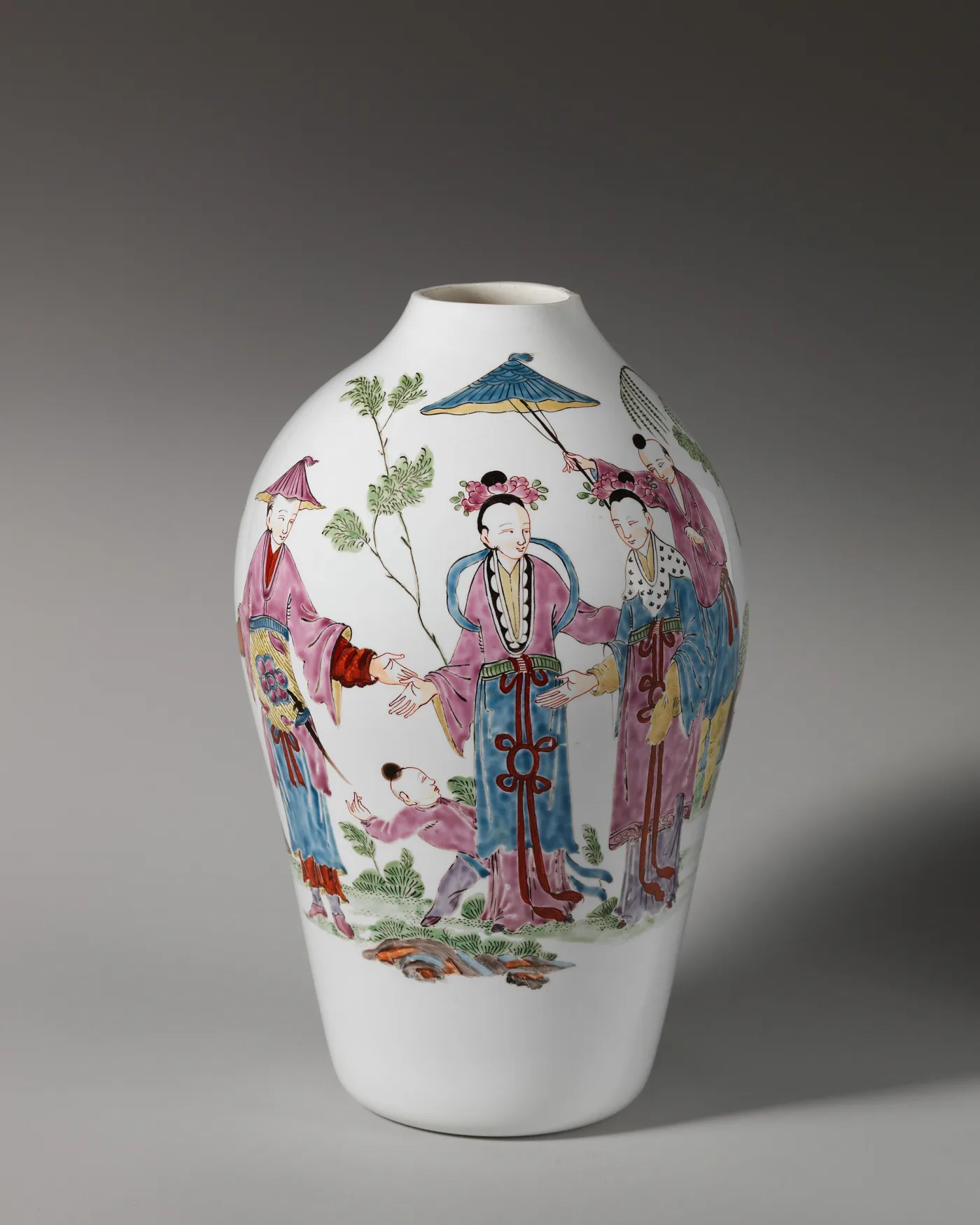 Opaque white glass vase painted in coloured enamels with Chinese figures standing under a parasol