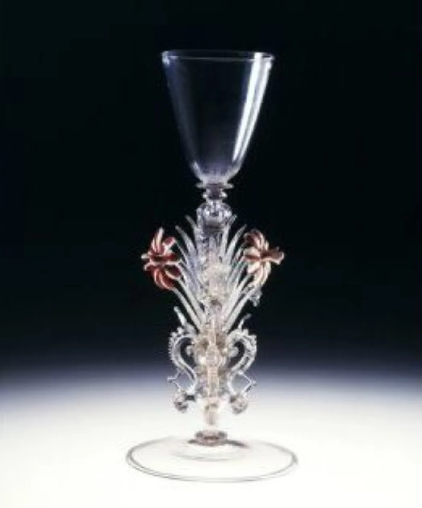 Venetian goblet with an elaborate winged stem of pinched and applied clear and coloured glass