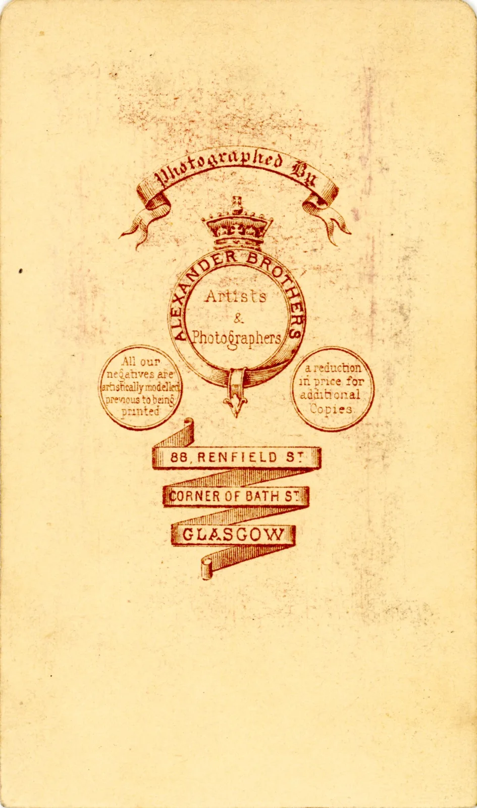 The reverse of the same card, printed in red with an elaborate crest, the studio name Alexander Brothers, the word Photographers and a street address in Glasgow
