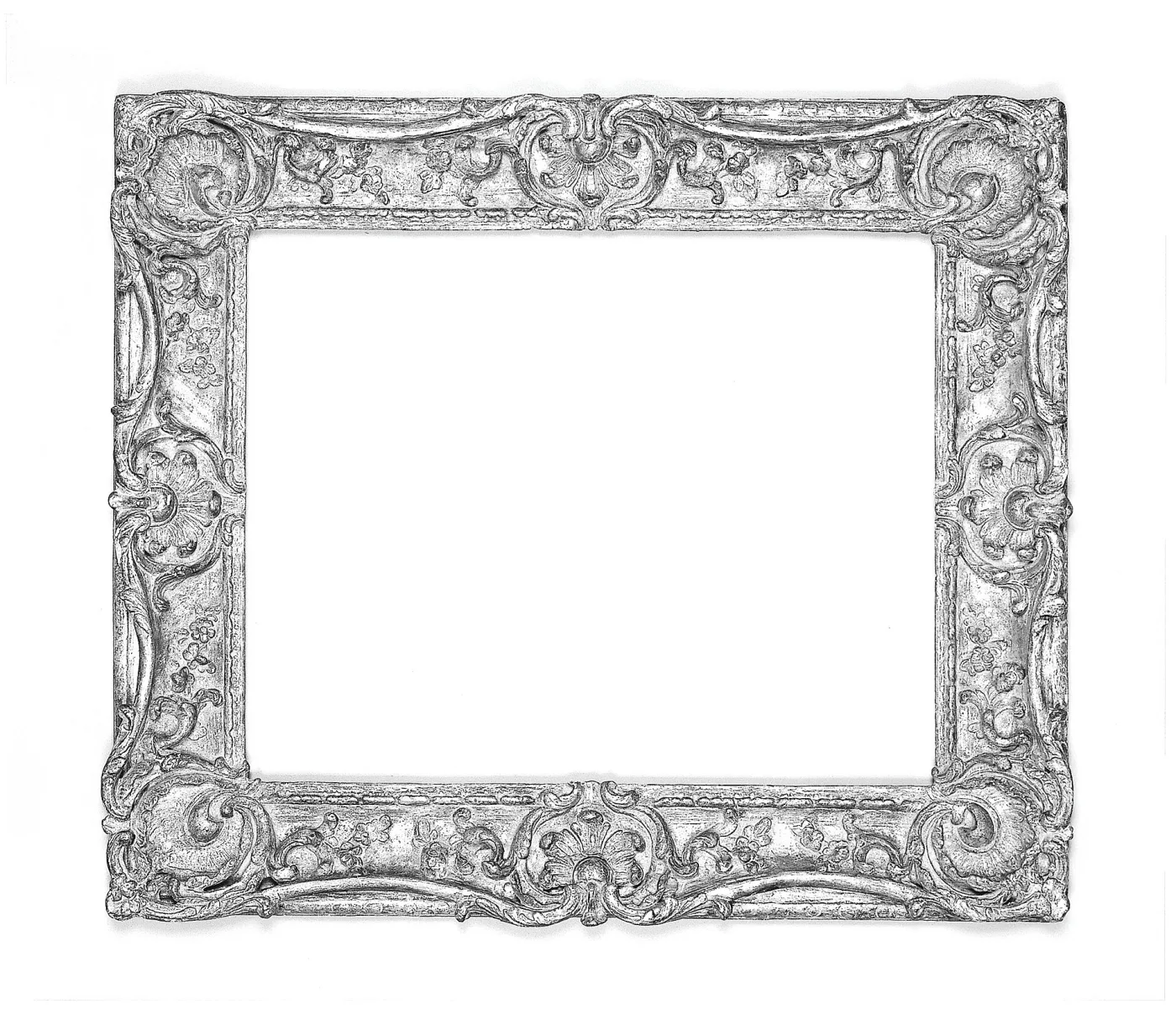 French Rococo swept picture frame of the mid eighteenth century photographed in black and white, its rails curving outward in asymmetric scrolls with pierced foliate carving at the corners and centres