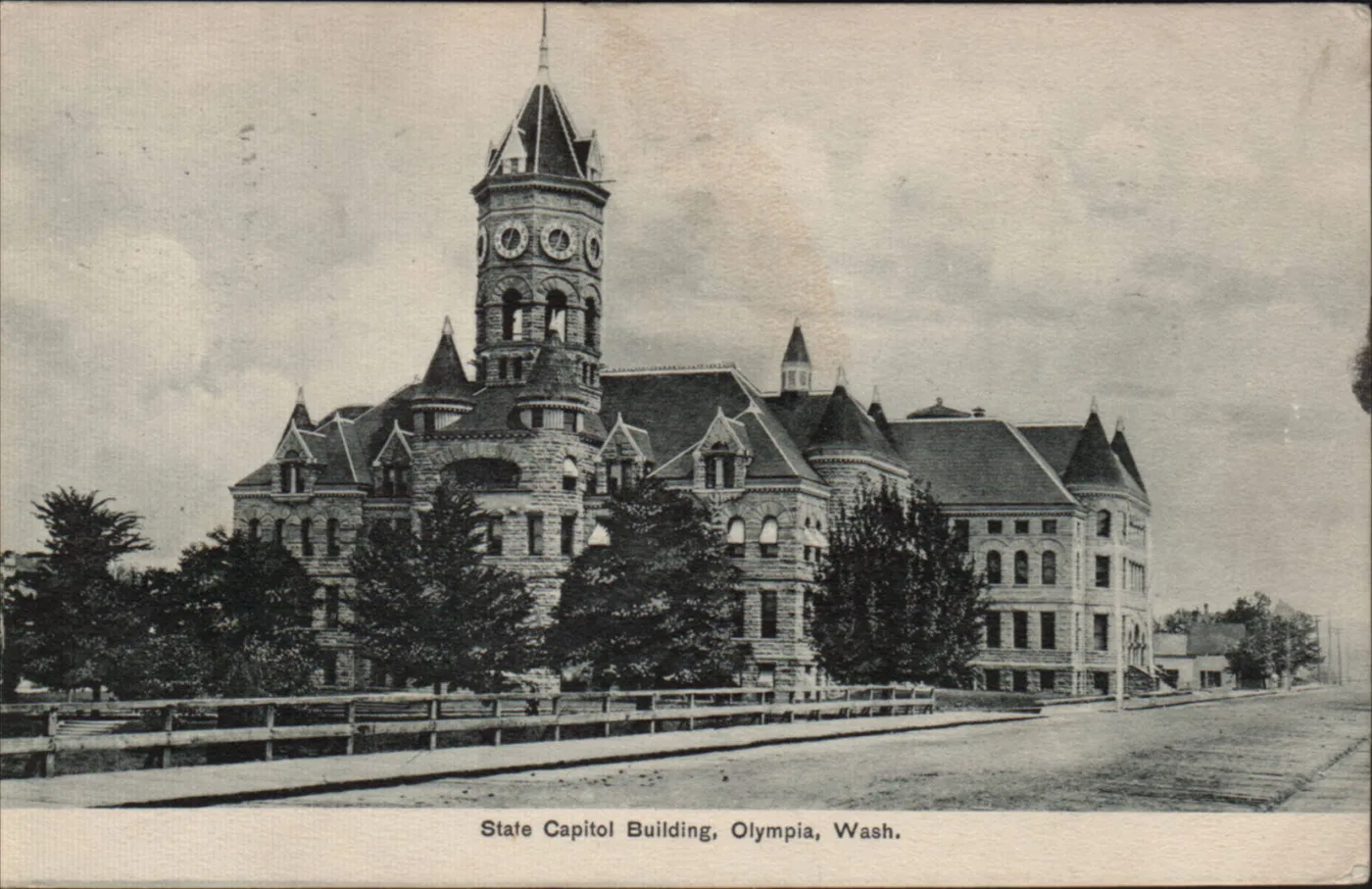 Monochrome view postcard of the State Capitol Building at Olympia, Washington, the image running to the card edges with a printed caption in the lower margin