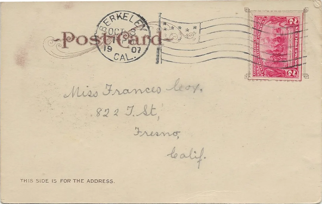 Back of a postcard postmarked 1907, with an ornate Post Card heading, a two-cent stamp, a handwritten address and the printed line THIS SIDE IS FOR THE ADDRESS