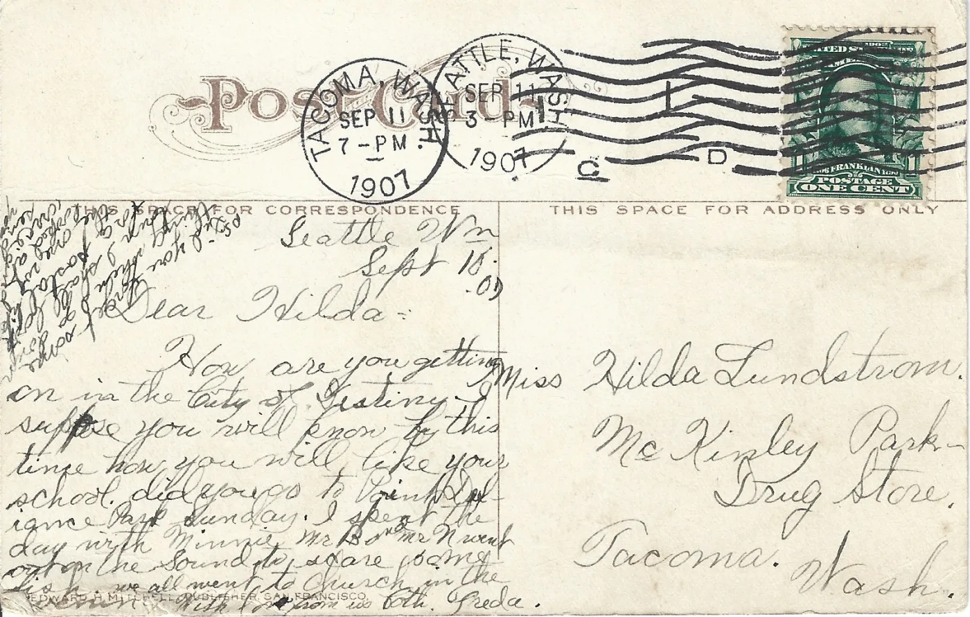 Divided back of a 1907 postcard carrying two circular postmarks, a one-cent Franklin stamp, a pencil message and the publisher's name printed along the bottom edge