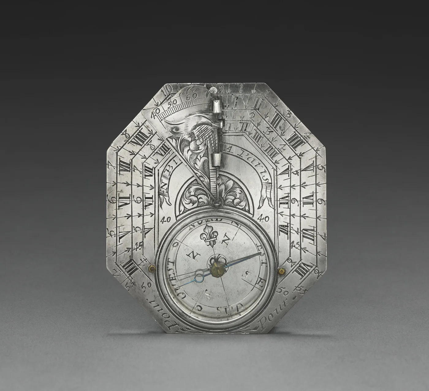 Octagonal silver Butterfield-type pocket sundial with a folding bird-shaped gnomon, three nested sets of Roman hour numerals and an inset compass