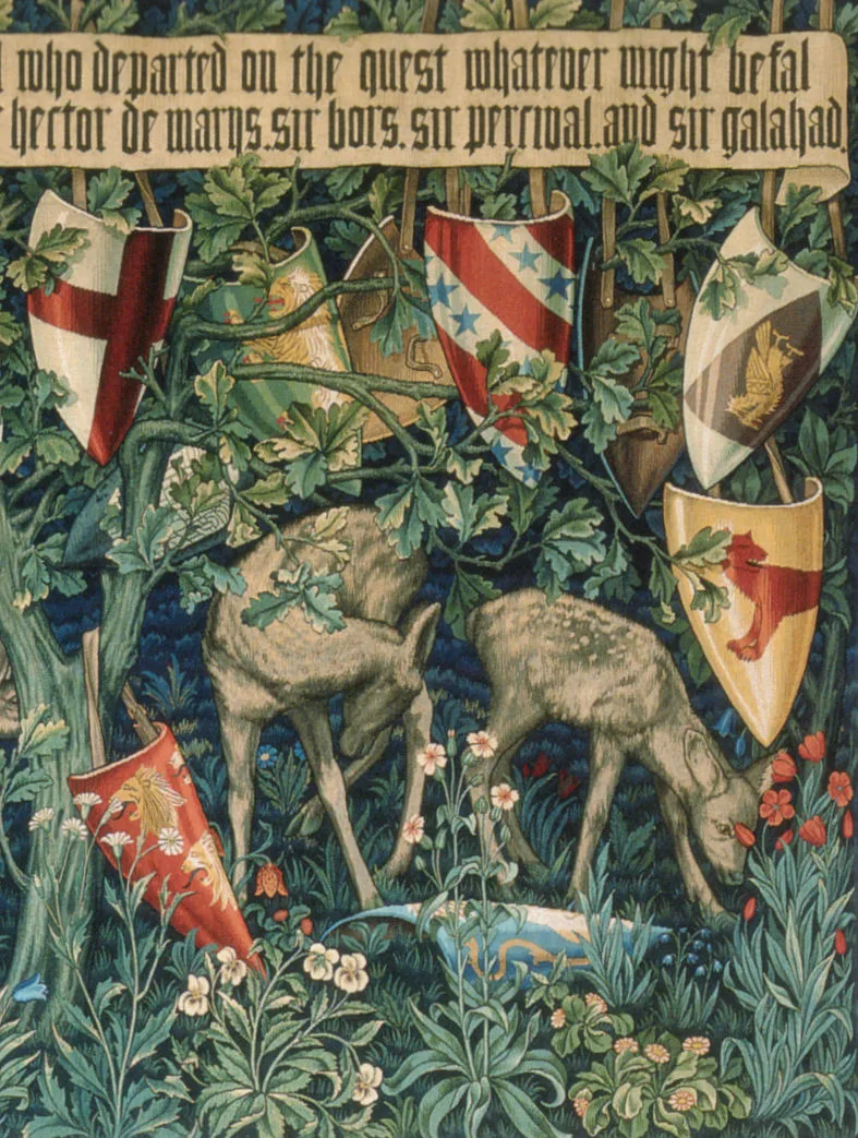 Detail of a Morris and Company verdure tapestry of 1900 with two deer grazing among dense flowering plants, five heraldic shields hanging from the foliage, and a blackletter inscription band across the top naming Sir Bors, Sir Percival and Sir Galahad