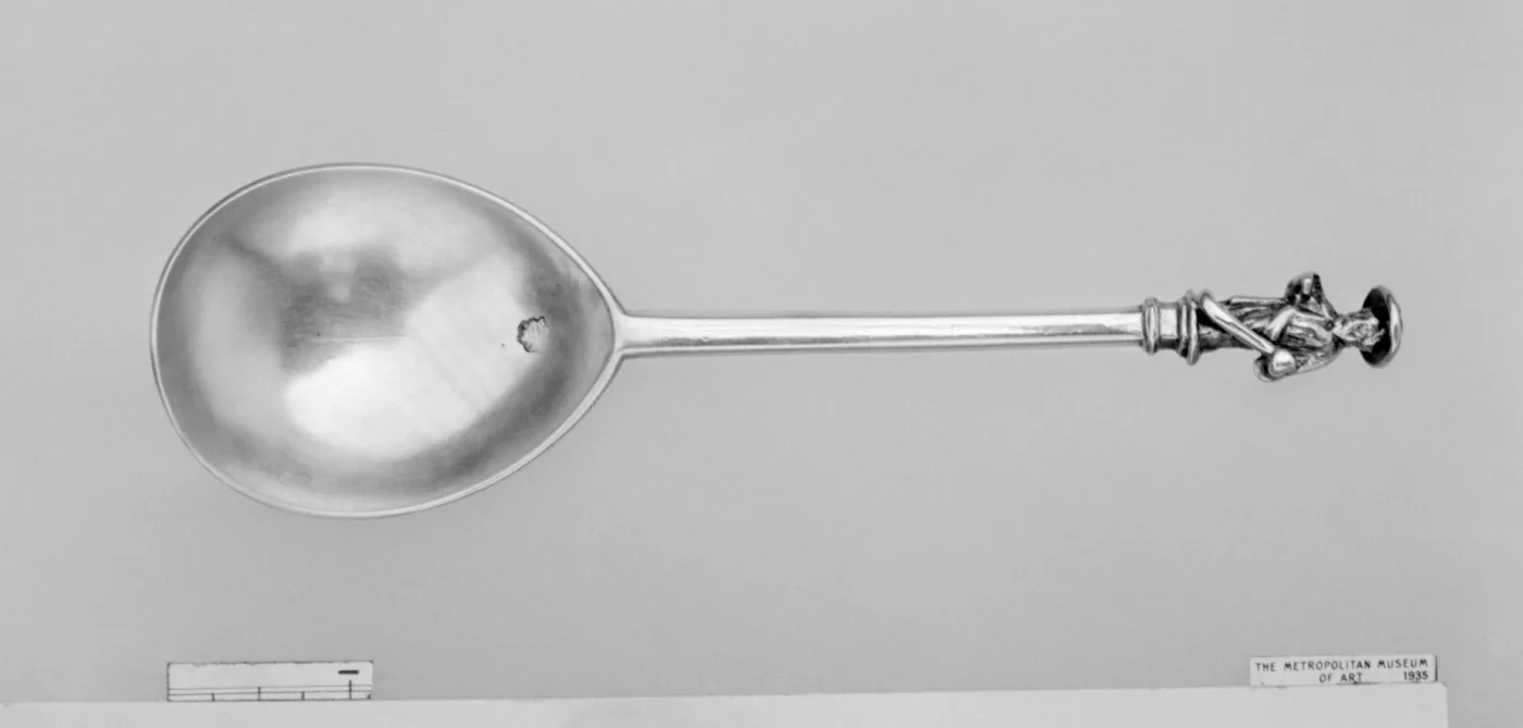 English apostle spoon of 1565 with a cast figure of a saint on a hexagonal stem above a deep fig-shaped bowl