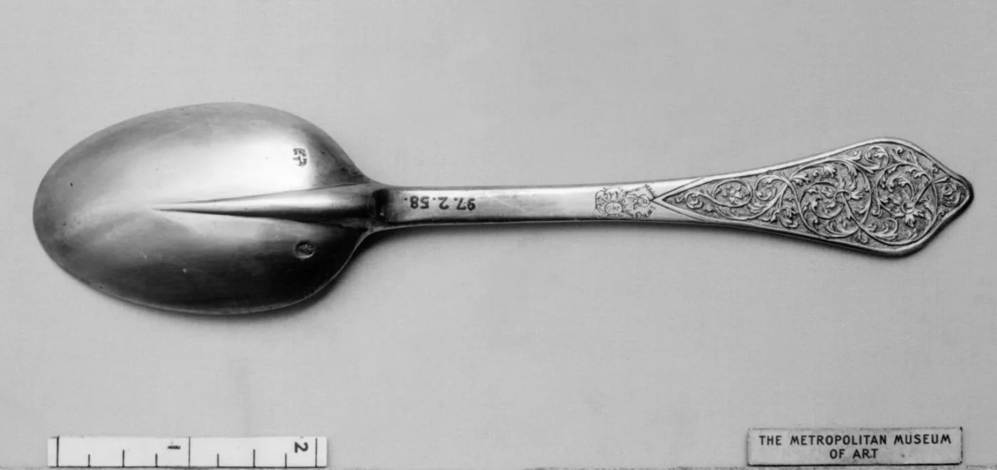 Back of an English silver spoon of 1712 showing a long tapering rat-tail rib running from the stem well down into the bowl