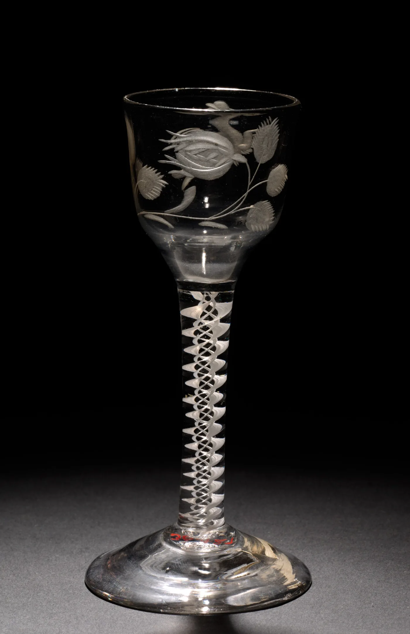English double series opaque white twist stem with a solid enamel core wrapped by an outer spiral, below an engraved bowl