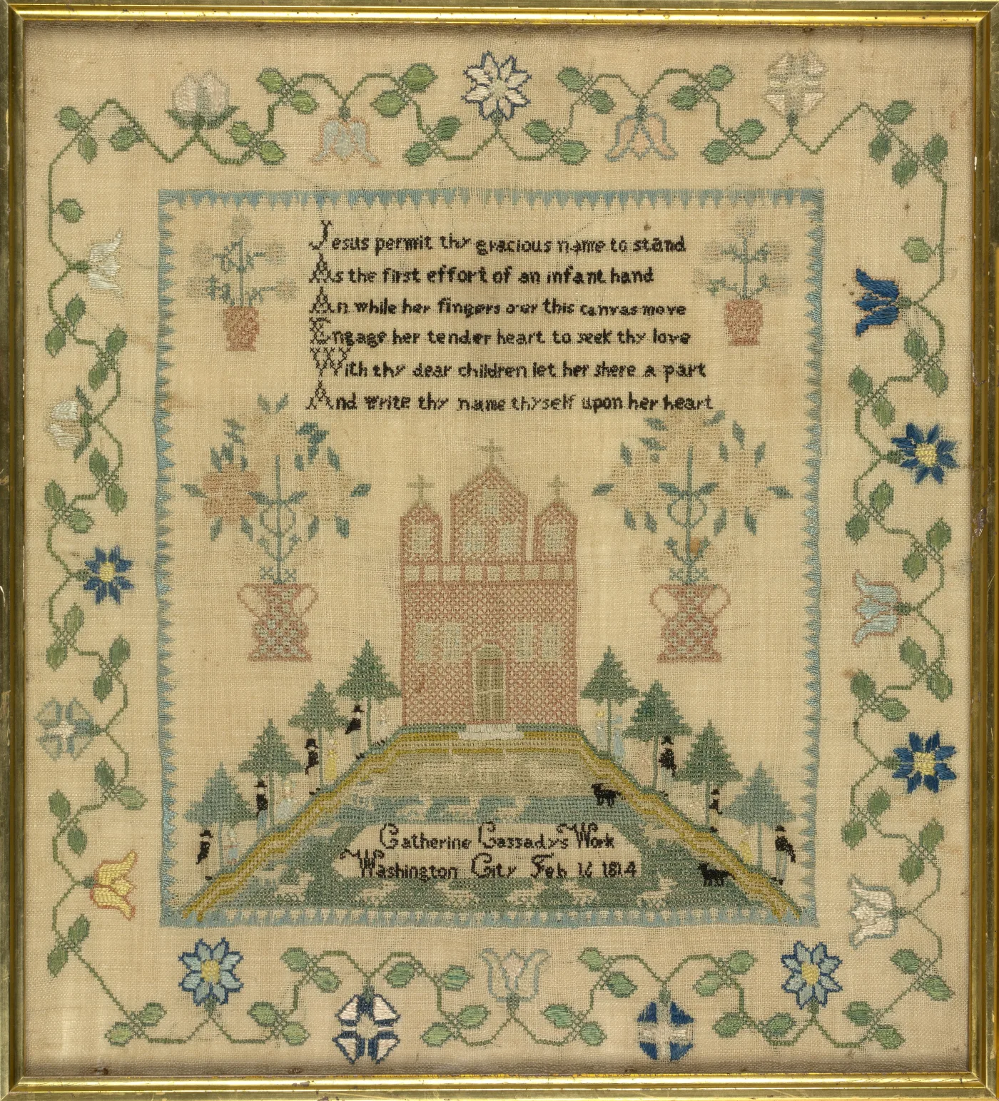 Silk sampler with a six-line verse above a pink brick house with three gables on a green mound with trees and figures, inscribed Catherine Cassady's Work Washington City Feb 16 1814