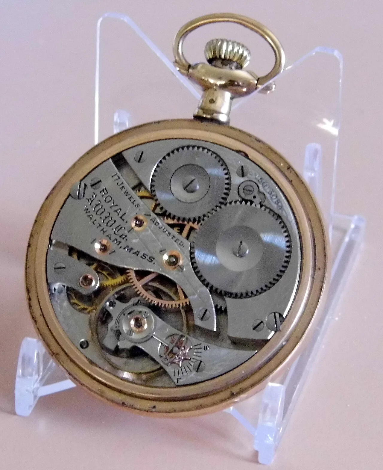 Nickel pocket watch movement in a gold-coloured open-face case, engraved Royal, 17 Jewels, Adjusted, A.W.W.Co. and Waltham Mass.